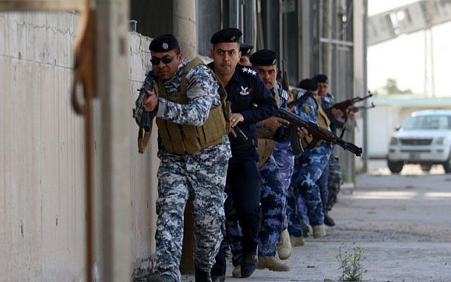 Iraqi security forces, in charge of the port security, take part in an exercise to simulate a terrorist attack on February 8, 2016 at the Iraqi port of Umm Qasr near the southern city of Basra. (AFP / HAIDAR MOHAMMED ALI) Iraqi security forces, in charge of the port security, take part in an exercise to simulate a terrorist attack on February 8, 2016 at the Iraqi port of Umm Qasr near the southern city of Basra. (AFP / HAIDAR MOHAMMED ALI)