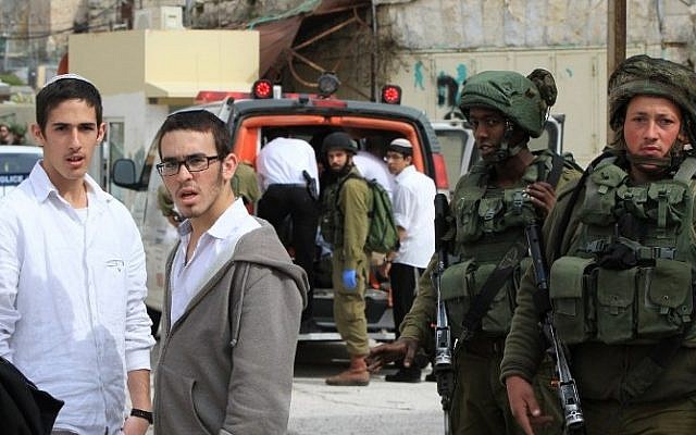The site where a Palestinian woman tried to stab an Israeli soldier before being shot dead, in Hebron, on February 13, 2016 (AFP / HAZEM BADER)