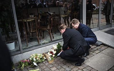 Danish Prime Minister Lars Lokke Rasmussen (L) and Mayor of Copenhagen Frank Jensen lay flowers at Krudttonden in Copenhagen February 14, 2016 in memory of Finn Norgaard who was killed while attending a culture arrangement at Krudttonden last year. (AFP / Scanpix / Olafur Steinar Gestsson / Denmark OUT) Danish Prime Minister Lars Lokke Rasmussen (L) and Mayor of Copenhagen Frank Jensen lay flowers at Krudttonden in Copenhagen February 14, 2016 in memory of Finn Norgaard who was killed while attending a culture arrangement at Krudttonden last year. (AFP / Scanpix / Olafur Steinar Gestsson / Denmark OUT)