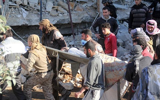 People carry a stretcher amid debris after a hospital supported by Doctors Without Borders was hit by suspected Russian air strikes near Maaret al-Numan, in Syria's northern province of Idlib, on February 15, 2016. (AFP / Omar haj kadour) People carry a stretcher amid debris after a hospital supported by Doctors Without Borders was hit by suspected Russian air strikes near Maaret al-Numan, in Syria's northern province of Idlib, on February 15, 2016. (AFP / Omar haj kadour)