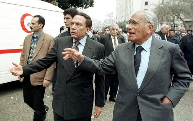 This file photo taken on February 6, 1999 shows Egyptian journalist Mohammad Hassenin Heikal (R) and comedian Adel Imam attending the funeral of Egyptian writer Lotfi al-Kholi, a leading promoter of peace with Israel. (AFP / AMR NABIL) This file photo taken on February 6, 1999 shows Egyptian journalist Mohammad Hassenin Heikal (R) and comedian Adel Imam attending the funeral of Egyptian writer Lotfi al-Kholi, a leading promoter of peace with Israel. (AFP / AMR NABIL)