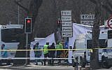 Turkish forensic experts inspect the explosion scene in Ankara on February 18, 2016 a day after a car bombing that targeted military vehicles. (AFP / ADEM ALTAN)