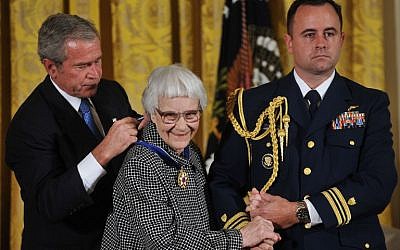 This file photo taken on November 05, 2007 shows then-US President George W. Bush presenting the 2007 Presidential Medal of Freedom to 'To Kill A Mockingbird' novelist Harper Lee in the East Room of the White House in Washington, DC. (AFP/MANDEL NGAN) This file photo taken on November 05, 2007 shows then-US President George W. Bush presenting the 2007 Presidential Medal of Freedom to 'To Kill A Mockingbird' novelist Harper Lee in the East Room of the White House in Washington, DC. (AFP/MANDEL NGAN)