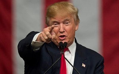 Then-Republican presidential candidate Donald Trump speaks during a campaign rally in North Charleston, South Carolina, February 19, 2016 (AFP/JIM WATSON)