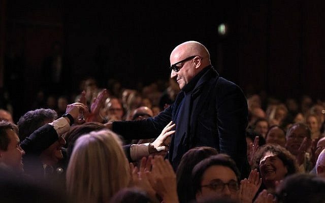 Italian director Gianfranco Rosi reacts on his way to the stage to receive the Golden Bear for Best Film for the film "Fuocoammare" (Fire at Sea) during the awards ceremony of the 66th Berlinale, Europe's first major film festival of the year, on February 20, 2016 in Berlin. (Tobias Schwarz/AFP) Italian director Gianfranco Rosi reacts on his way to the stage to receive the Golden Bear for Best Film for the film "Fuocoammare" (Fire at Sea) during the awards ceremony of the 66th Berlinale, Europe's first major film festival of the year, on February 20, 2016 in Berlin. (Tobias Schwarz/AFP)