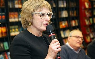 Lithuanian writer Ruta Vanagaite presents the book 'Our People' (Musiskiai) with co-author top Nazi hunter Efraim Zuroff, February 17, 2016. (AFP/Petras Malukas_