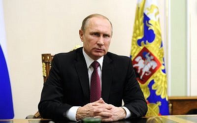 Russian President Vladimir Putin delivers an address on the US and Russia's agreement to enforce ceasefire in Syria in his office near Moscow on February 22, 2016. (AFP / SPUTNIK / MICHAEL KLIMENTYEV)