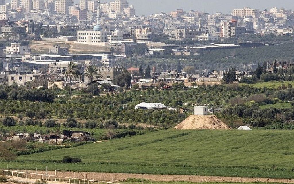 File: A photo taken from the Israeli side of the border with the Gaza Strip shows a Hamas outpost on a hill (right) along the border, February 25, 2016. (AFP/Jack Guez) File: A photo taken from the Israeli side of the border with the Gaza Strip shows a Hamas outpost on a hill (right) along the border, February 25, 2016. (AFP/Jack Guez)