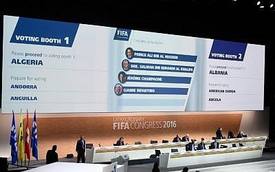 A monitor displays the names of the FIFA presidential candidates (from top) Prince Ali bin al-Hussein, Sheikh Salman bin Ebrahim al-Khalifa, Jerome Champagne and Gianni Infantino during an extraordinary FIFA Congress at the headquarters of the world's governing body of soccer in Zurich on February 26, 2016.
(AFP/OLIVIER MORIN)