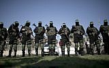 Hamas fighters take part in an anti-Israel rally in the southern Gaza Strip town of Rafah, February 26, 2016. (AFP/Said Khatib)