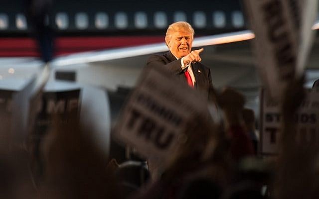Republican presidential candidate Donald Trump addresses a rally at Millington Regional Jetport on February 27, 2016 in Millington, Tennessee. (AFP / Michael B. Thomas)