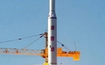 This picture taken from North Korean TV and released by South Korean news agency Yonhap on February 7, 2016 shows North Korea's locket launch of earth observation satellite Kwangmyong 4 (AFP PHOTO / North Korean TV via YONHAP)