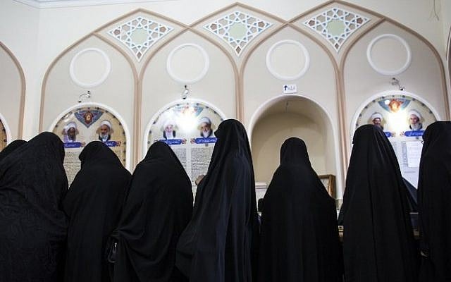 Iranian women line up to vote for both parliamentary elections and the Assembly of Experts at a polling station at the Massoumeh shrine in the holy city of Qom, 130 kms south of Tehran, on February 26, 2016. (AFP PHOTO/BEHROUZ MEHRI) Iranian women line up to vote for both parliamentary elections and the Assembly of Experts at a polling station at the Massoumeh shrine in the holy city of Qom, 130 kms south of Tehran, on February 26, 2016. (AFP PHOTO/BEHROUZ MEHRI)