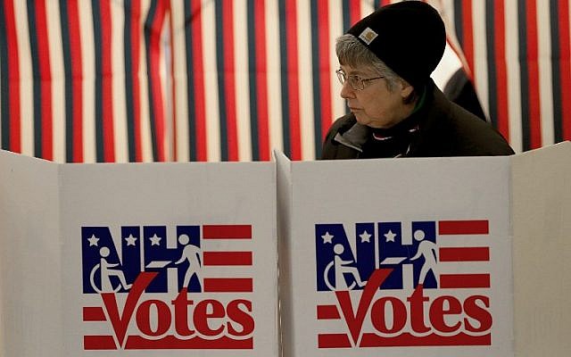 A voter casts her ballot at the Canterbury Town Hall, February 9, 2016 in Canterbury, New Hampshire. (Win McNamee/Getty Images/AFP) A voter casts her ballot at the Canterbury Town Hall, February 9, 2016 in Canterbury, New Hampshire. (Win McNamee/Getty Images/AFP)