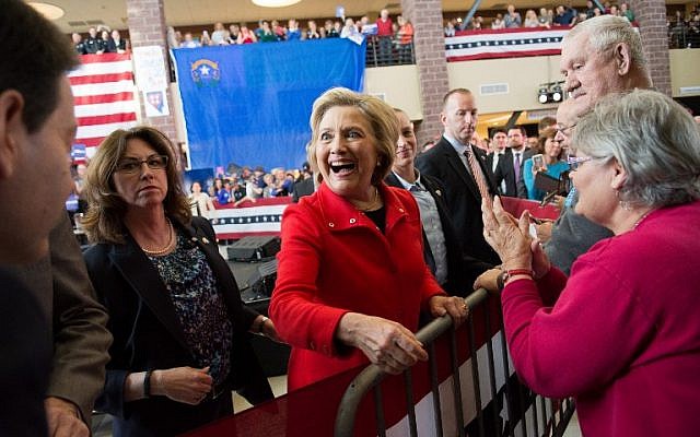 Democratic Presidential candidate and former Secretary of State Hillary Clinton greet supporters following a campaign rally at Truckee Meadows Community College in Reno, Nevada, February 15, 2016. (David Calvert/Getty Images/AFP)