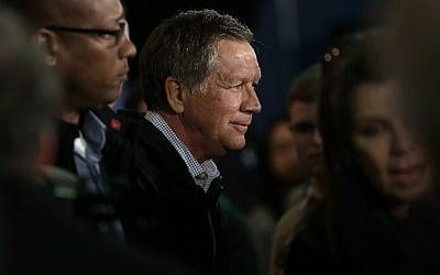 Republican presidential candidate Ohio Gov. John Kasich greets South Carolina voters after delivering remarks aboard the USS Yorktown during a campaign appearance on February 19, 2016 in Mount Pleasant, South Carolina. (Win McNamee/Getty Images/AFP)