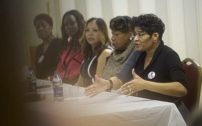Right, Geneva Reed-Veal, mother of Sandra Bland, whose child was killed by gun violence, speaks during a Hillary Clinton for South Carolina 'Breaking Down Barriers' forum on February 22, 2016 at the Mt. Zion Missionary Baptist Church in Sumter, South Carolina. The participants were Sybrina Fulton, mother of Trayvon Martin; Geneva Reed-Veal, mother of Sandra Bland; Gwen Carr, mother of Eric Garner; Maria Hamilton, mother of Dontre Hamilton; and Lucy McBath, mother of Jordan Davis. (Mark Makela/Getty Images/AFP)