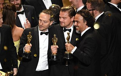 Cinematographer Emmanuel Lubezki, actor Leonardo DiCaprio and director Alejandro Gonzalez Inarritu, all winners for 'The Revenant,' pose onstage during the 88th Annual Academy Awards at the Dolby Theatre, February 28, 2016 in Hollywood, California. (Kevin Winter/Getty Images/AFP) Cinematographer Emmanuel Lubezki, actor Leonardo DiCaprio and director Alejandro Gonzalez Inarritu, all winners for 'The Revenant,' pose onstage during the 88th Annual Academy Awards at the Dolby Theatre, February 28, 2016 in Hollywood, California. (Kevin Winter/Getty Images/AFP)