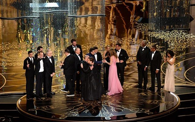 The cast of "Spotlight" accept the Best Motion Picture of the Year award onstage during the 88th Annual Academy Awards at the Dolby Theatre, February 28, 2016. (Kevin Winter/Getty Images/AFP) The cast of "Spotlight" accept the Best Motion Picture of the Year award onstage during the 88th Annual Academy Awards at the Dolby Theatre, February 28, 2016. (Kevin Winter/Getty Images/AFP)