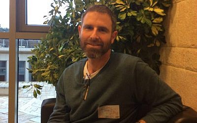 Natan Meir at the Knesset to witness the passage for Israel's foster care law, February 23, 2016. The law was dedicated to his wife Dafna Meir, who was murdered by a terrorist on January 17, 2016. (Renee Ghert-Zand/TOI)