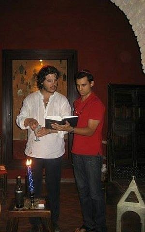 Haim Casas (left) leads havdalah at Casa de Sefarad in Cordoba, Spain, 2011. (Courtesy)
