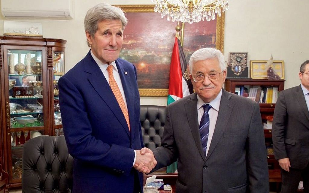 US Secretary of State John Kerry shakes hands with Palestinian Authority President Mahmoud Abbas on February 21, 2016 in Amman, Jordan. (US State Department)