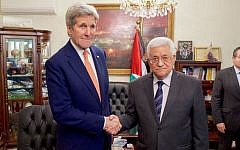 US Secretary of State John Kerry (left) shakes hands with Palestinian Authority President Mahmoud Abbas on February 21, 2016 in Amman, Jordan. (US State Department)