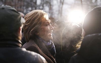 Democratic presidential candidate Hillary Clinton campaigns outside a polling place during the first-in-the-nation presidential primary, Tuesday, Feb. 9, 2016, in Manchester, N.H. (AP Photo/Matt Rourke)