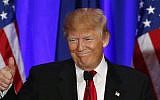 Republican presidential candidate Donald Trump gives a thumbs up during a South Carolina Republican primary night event in Spartanburg, South Carolina, Saturday, Feb. 20, 2016. (AP Photo/Paul Sancya)