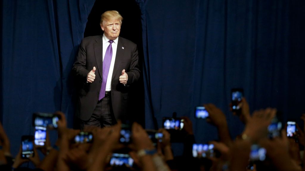Republican presidential candidate Donald Trump arrives for a caucus night rally Tuesday, February 23, 2016, in Las Vegas. (AP Photo/Jae C. Hong) Republican presidential candidate Donald Trump arrives for a caucus night rally Tuesday, February 23, 2016, in Las Vegas. (AP Photo/Jae C. Hong)