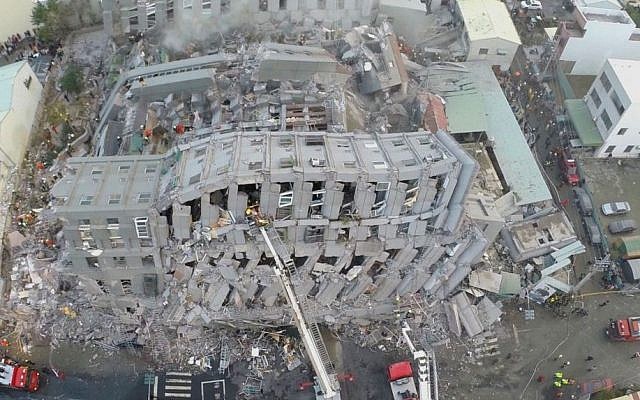 In this photo taken from a drone, rescue workers search a collapsed building from an early morning earthquake in Tainan, Taiwan, Saturday, Feb. 6, 2016. (AP Photo) In this photo taken from a drone, rescue workers search a collapsed building from an early morning earthquake in Tainan, Taiwan, Saturday, Feb. 6, 2016. (AP Photo)
