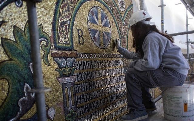 A restoration expert works on a mosaic inside the Church of the Nativity in the West Bank city of Bethlehem on Feb 4, 2016. (AP Photo/Nasser Nasser) A restoration expert works on a mosaic inside the Church of the Nativity in the West Bank city of Bethlehem on Feb 4, 2016. (AP Photo/Nasser Nasser)