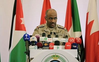Saudi military spokesman Ahmed Asiri briefs journalists on the Saudi-led coalition's strikes on Houthi rebels in Yemen, during a press conference, in Riyadh, Saudi Arabia, Tuesday, April 14, 2015. (AP Photo/Hasan Jamali)