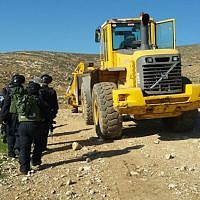 Soldiers from Israel's Civil Administration demolish a number of structures deemed illegal in the southern Hebron Hills on February 2, 2016. (Nasser Nawaja/B'Tselem) Soldiers from Israel's Civil Administration demolish a number of structures deemed illegal in the southern Hebron Hills on February 2, 2016. (Nasser Nawaja/B'Tselem)