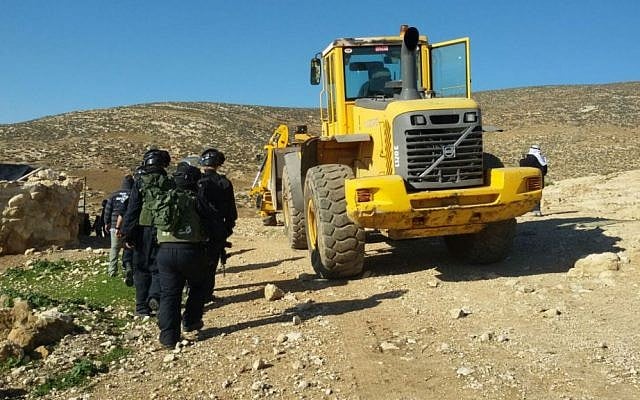 Soldiers from Israel's Civil Administration demolish a number of structures deemed illegal in the southern Hebron Hills on February 2, 2016. (Nasser Nawaja/B'Tselem) Soldiers from Israel's Civil Administration demolish a number of structures deemed illegal in the southern Hebron Hills on February 2, 2016. (Nasser Nawaja/B'Tselem)