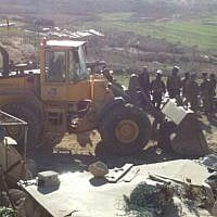Soldiers from Israel's Civil Administration demolish a number of structures deemed illegal in the southern Hebron Hills on February 2, 2016. (Nasser Nawaja/B'Tselem) Soldiers from Israel's Civil Administration demolish a number of structures deemed illegal in the southern Hebron Hills on February 2, 2016. (Nasser Nawaja/B'Tselem)