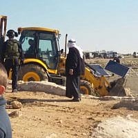 Soldiers from Israel's Civil Administration demolish a number of structures deemed illegal in the southern Hebron Hills on February 2, 2016. (Nasser Nawaja/B'Tselem) Soldiers from Israel's Civil Administration demolish a number of structures deemed illegal in the southern Hebron Hills on February 2, 2016. (Nasser Nawaja/B'Tselem)