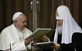 Pope Francis, left, embraces Russian Orthodox Patriarch Kirill after signing a joint declaration on religious unity at the Jose Marti International airport in Havana, Cuba, Friday, Feb. 12, 2016 (AP Photo/Gregorio Borgia, Pool)