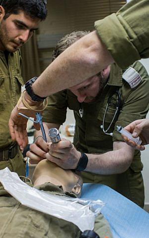 An IDF paramedic practices intubation on a smart doll that mimics the human respiratory system in the Medical Simulation Center at Tel Hashomer Hospital in Ramat Gan on February 11, 2016. (Adi Brown/IDF Spokesperson's Unit) An IDF paramedic practices intubation on a smart doll that mimics the human respiratory system in the Medical Simulation Center at Tel Hashomer Hospital in Ramat Gan on February 11, 2016. (Adi Brown/IDF Spokesperson's Unit)