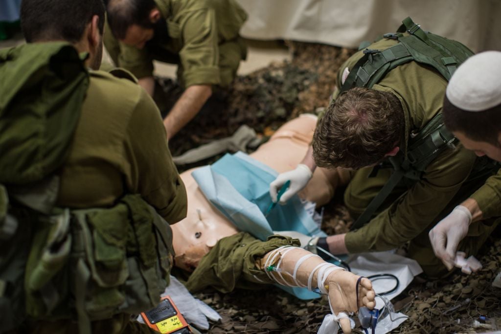IDF medical personnel treat their 'patients,' smart dolls that mimics the human respiratory and circulatory systems, in the Medical Simulation Center at Tel Hashomer Hospital in Ramat Gan on February 11, 2016. (Adi Brown/IDF Spokesperson's Unit) IDF medical personnel treat their 'patients,' smart dolls that mimics the human respiratory and circulatory systems, in the Medical Simulation Center at Tel Hashomer Hospital in Ramat Gan on February 11, 2016. (Adi Brown/IDF Spokesperson's Unit)
