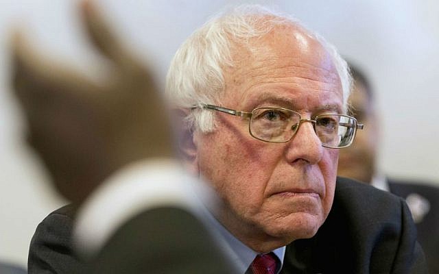 Democratic presidential candidate, Sen. Bernie Sanders, I-Vermont, listens to concerns voiced by leaders of nine historic civil rights groups during his meeting with the group at the National Urban League Washington Bureau in Washington, DC, Thursday Feb. 18, 2016. (AP Photo/Jacquelyn Martin)