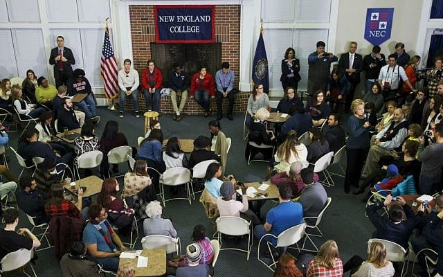 Democratic presidential candidate Hillary Clinton, at right, answers questions during a student town hall at New England College in Henniker, New Hampshire, Saturday Feb. 6, 2016. (AP Photo/Jacquelyn Martin)