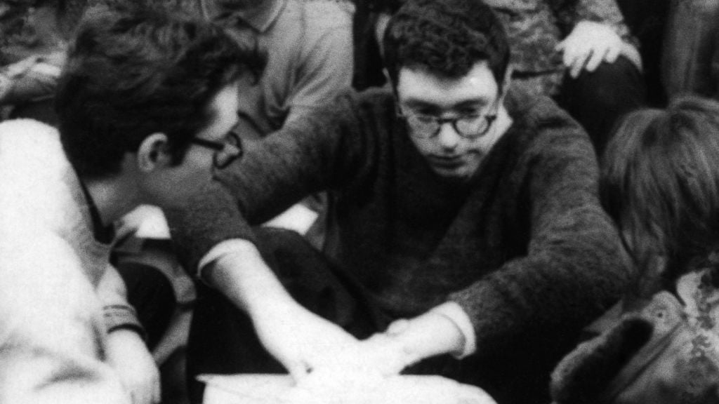 University of Chicago student Bernie Sanders (center), and other CORE activists attend a sit-in at the university during the civil rights movement, 1962. (Danny Lyon/Magnum Photos via AP) University of Chicago student Bernie Sanders (center), and other CORE activists attend a sit-in at the university during the civil rights movement, 1962. (Danny Lyon/Magnum Photos via AP)