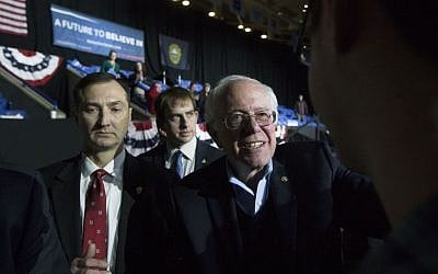 Democratic presidential candidate Sen. Bernie Sanders, I-Vt., smiles as he greats attendees during a campaign stop at the University of New Hampshire Whittemore Center Arena, Monday, Feb. 8, 2016, in Durham, N.H. (AP Photo/John Minchillo) 