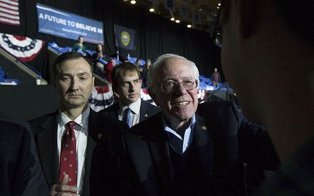 Democratic presidential candidate Sen. Bernie Sanders, I-Vt., smiles as he greats attendees during a campaign stop at the University of New Hampshire Whittemore Center Arena, Monday, Feb. 8, 2016, in Durham, N.H. (AP Photo/John Minchillo)