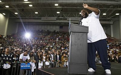 Hip hop artist and activist Killer Mike speaks during a rally with Democratic presidential candidate Sen. Bernie Sanders, I-Vermont, at Morehouse College in Atlanta, Tuesday, Feb. 16, 2016. (AP Photo/Evan Vucci)