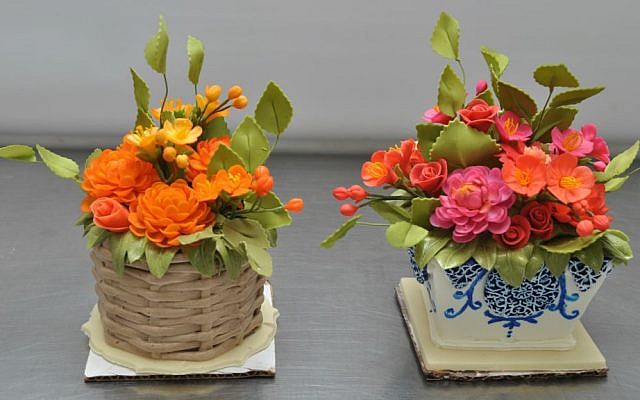 Miniature cakes by Sylvia Weinstock, who specializes in making lifelike sugar flowers. (Courtesy)