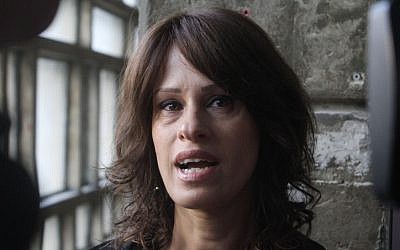 Maayan, one of the 'wives' of 'cult leader' and polygamist Go'el Razon, seen at the Tel Aviv District Court on September 08, 2014, where Ratzon father was found guilty of aggravated rape and other sexual offenses, but was acquitted of enslavement charges. (Flash90) Maayan, one of the 'wives' of 'cult leader' and polygamist Go'el Razon, seen at the Tel Aviv District Court on September 08, 2014, where Ratzon father was found guilty of aggravated rape and other sexual offenses, but was acquitted of enslavement charges. (Flash90)