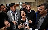 File: Joint (Arab) List MKs Hanin Zoabi (center),  Jamal Zahalka (right) and Basel Ghattas (center left, behind Zoabi) speak with the press in Jerusalem on February 17, 2015 (Hadas Parush/FLASH90)