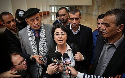 File: Joint (Arab) List MKs Hanin Zoabi (center), Jamal Zahalka (right) and Basel Ghattas (center left, behind Zoabi) speak with the press in Jerusalem on February 17, 2015 (Hadas Parush/FLASH90) File: Joint (Arab) List MKs Hanin Zoabi (center), Jamal Zahalka (right) and Basel Ghattas (center left, behind Zoabi) speak with the press in Jerusalem on February 17, 2015 (Hadas Parush/FLASH90)